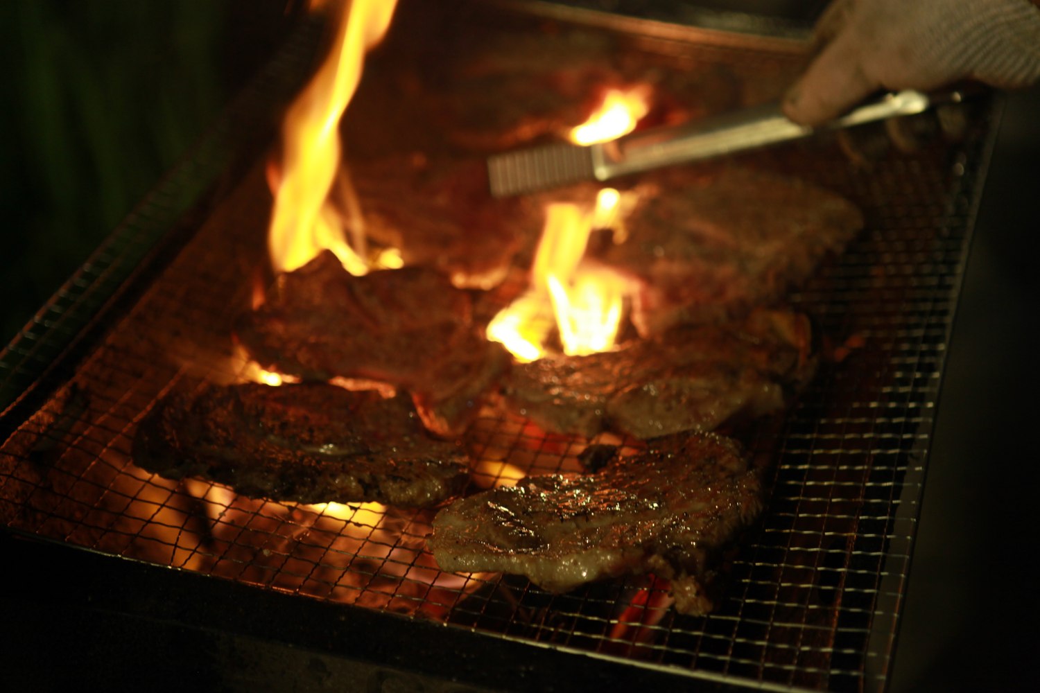 The outdoor barbecue lit